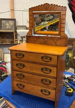 After: the oak dresser back together and refinished, mirror on